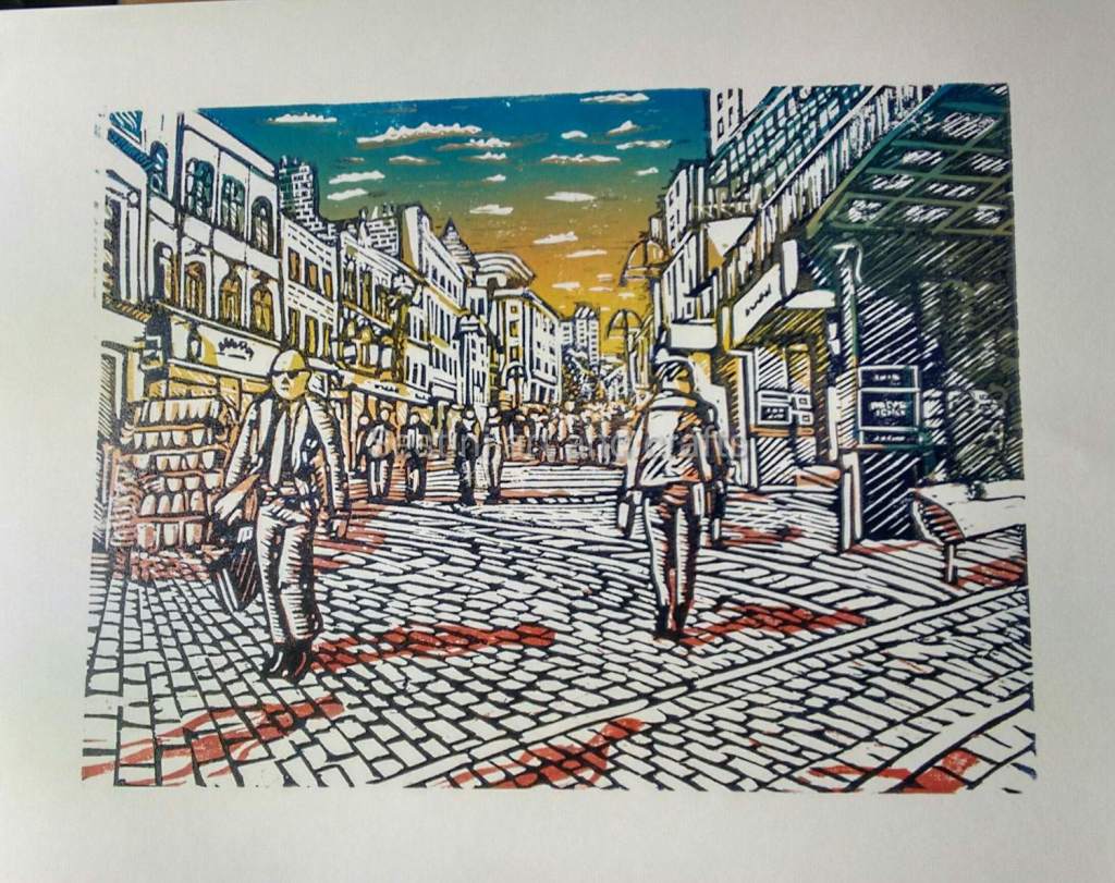 Colourful woodcut print of people walking down briggate