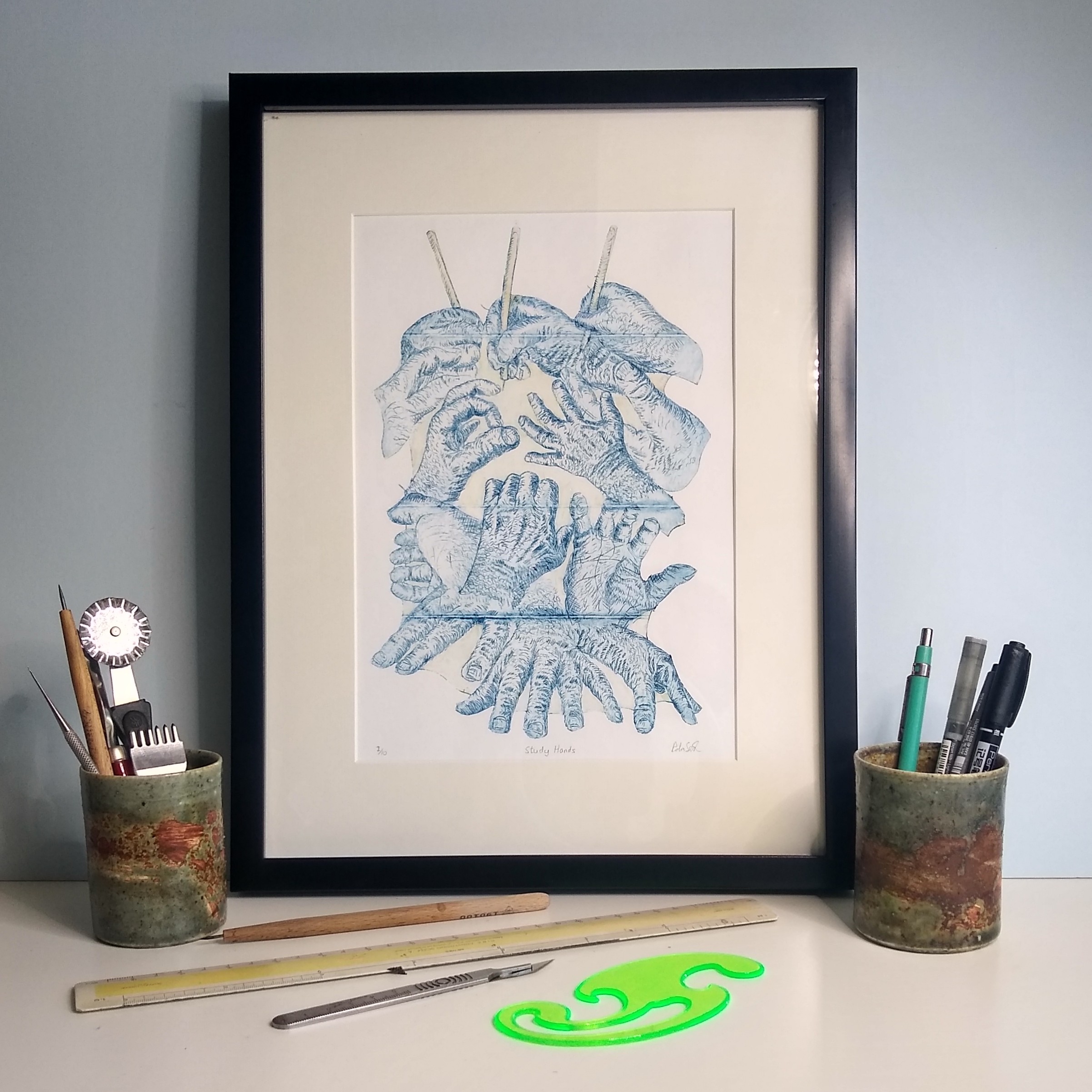 Drypoint print on Tetrapak study of hands in blue