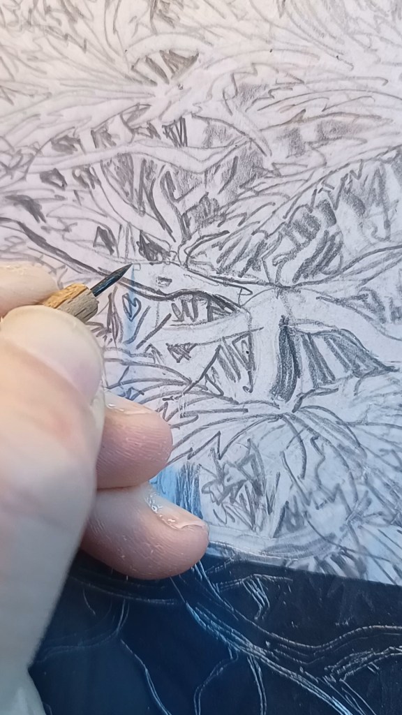 Detail of hand engraving the drypoint print