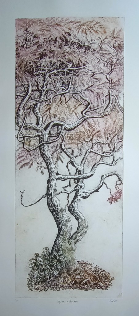 Old Japaneses tree in red and brown leaves